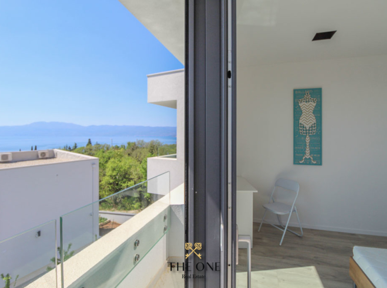 Beautiful villa with private pool offers amazing sea views, 3 residential units, private garden, garage.