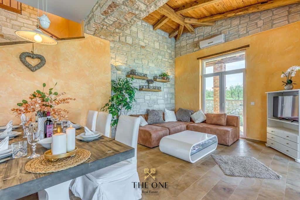Beautiful stone villa with a pool offers 4 bedrooms, 4 bathrooms, landscaped garden, private parking space.