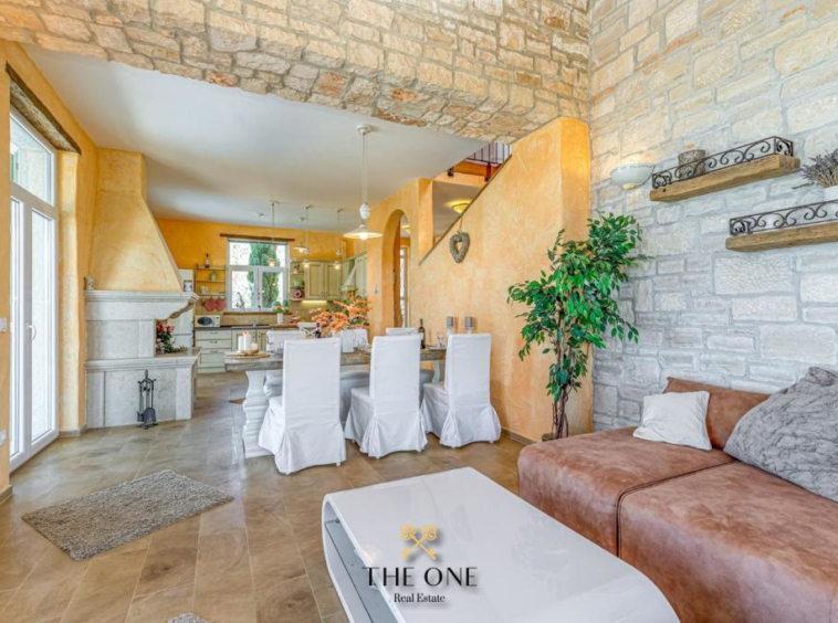 Beautiful stone villa with a pool offers 4 bedrooms, 4 bathrooms, landscaped garden, private parking space.