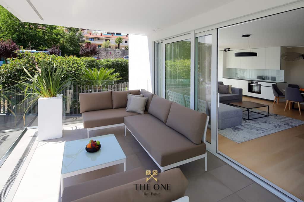 Luxury apartment just 100 m from sea offers 2 bedrooms, 2 bathrooms, garage, swimming pool.