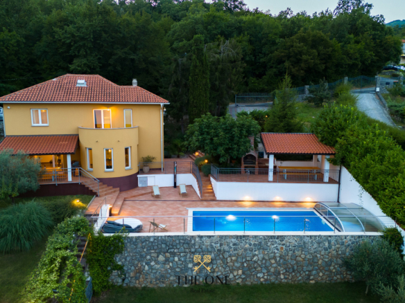 Beautiful villa overlooking entire Kvarner bay offers 5 bedrooms, 3 bathrooms, tennis court, private pool, sauna, gym, private outdoor parking place.