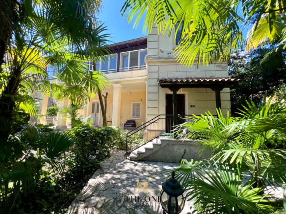 Villa in a very heart of Opatija features beautiful meticulous garden, 8 bedrooms, 5 bathrooms, private parking space.